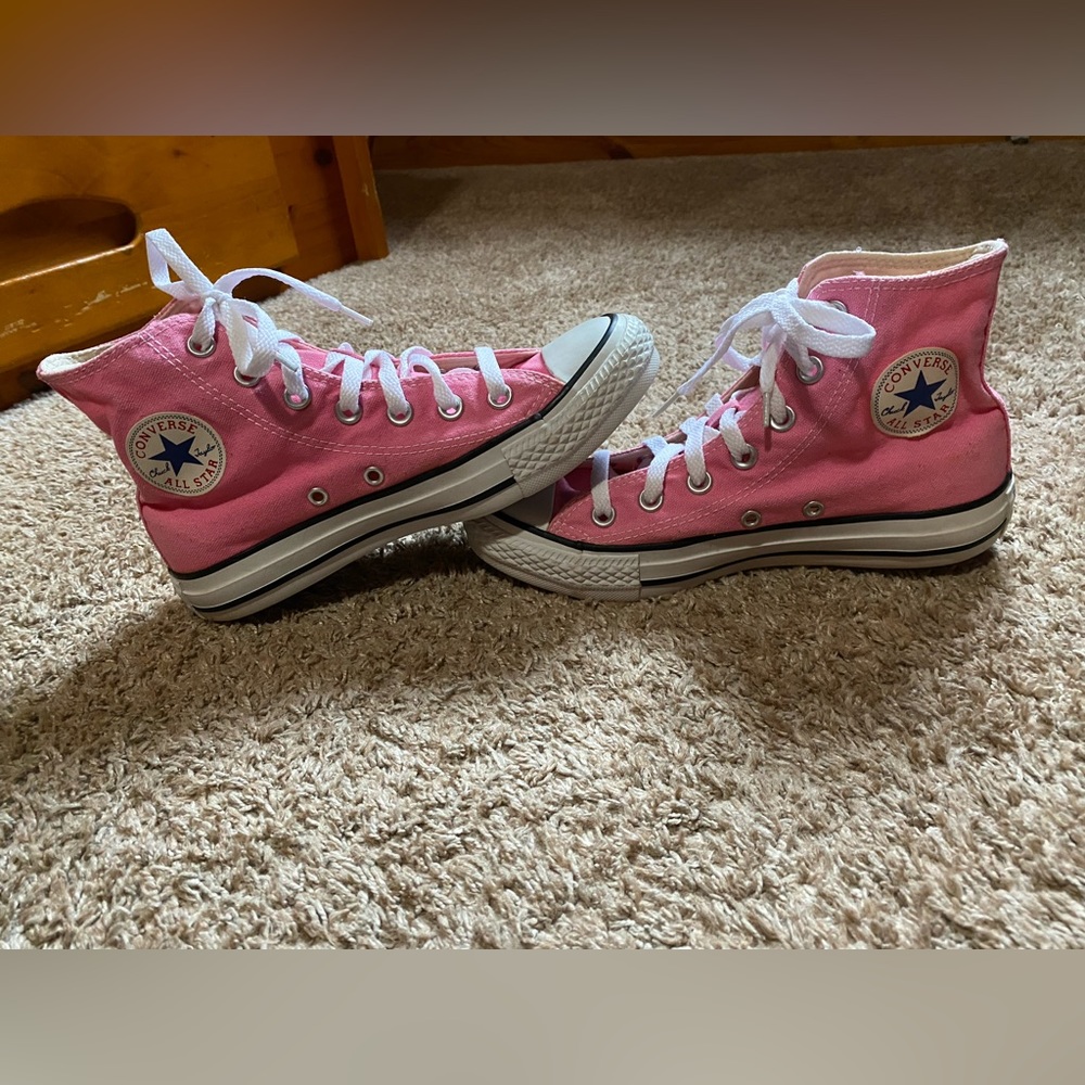 Pink Converse All Star High Tops.